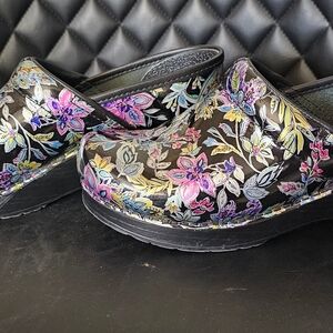 Dansko Black Floral Women's Clogs